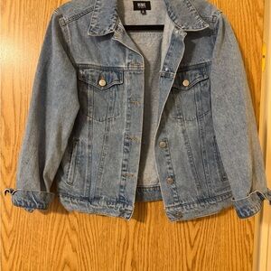 Denim jacket “cowboys” on back